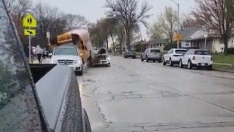 Stolen Kia Hits School Bus Unloading Kids