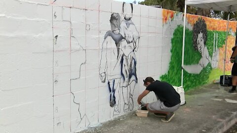 Artists revitalize historic Unity Wall in Lake Worth Beach