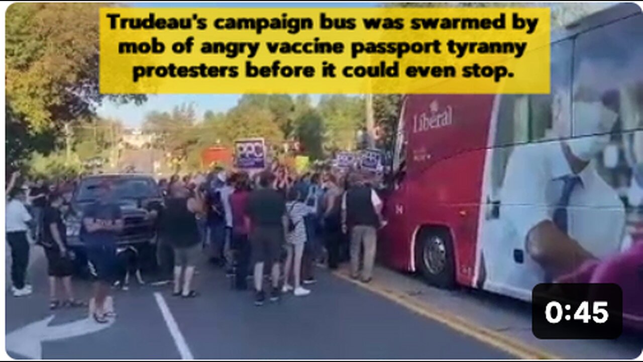 Trudeau's campaign bus swarmed by protesters before it could even stop.