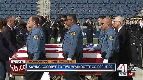 Deputies' caskets brought into memorial service