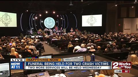 Funeral underway for the two car crash victims