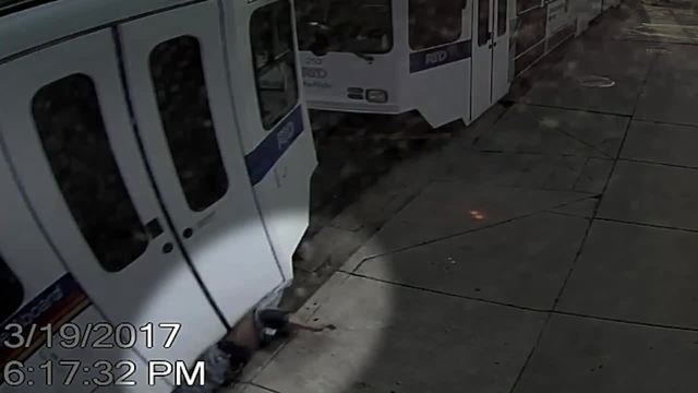 Raw video: Man survives after being dragged by RTD train