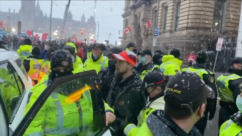 PEACEFUL PROTESTOR ARRESTED BY DOZENS OF POLICE