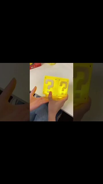 Thing of the day: a wall lamp in the style of those same cubes from Mario.