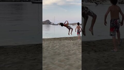 Doing Backflips for the kids at the beach