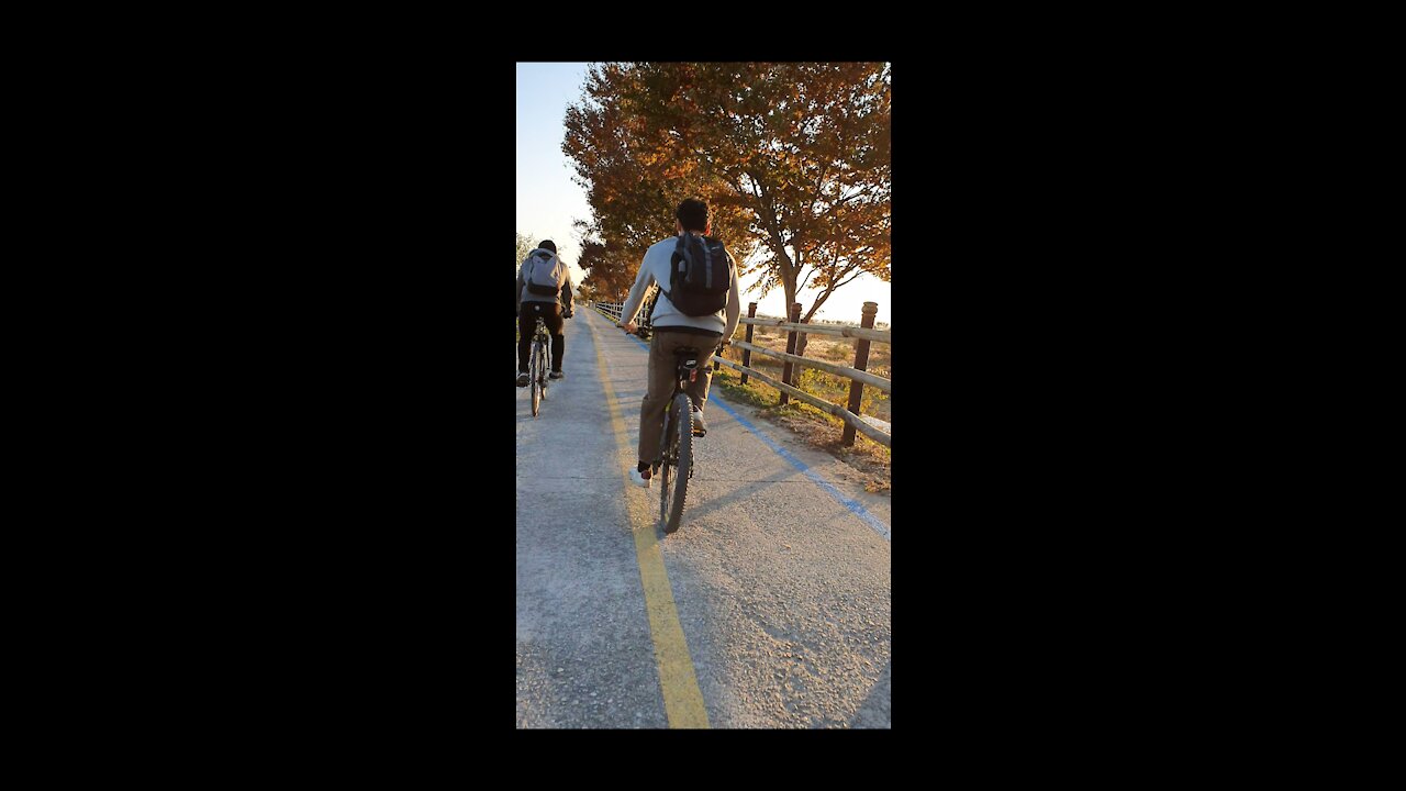 Riding a bike on a country road