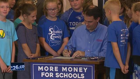 Walker signs state budget