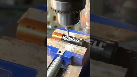 Piercing a double A battery