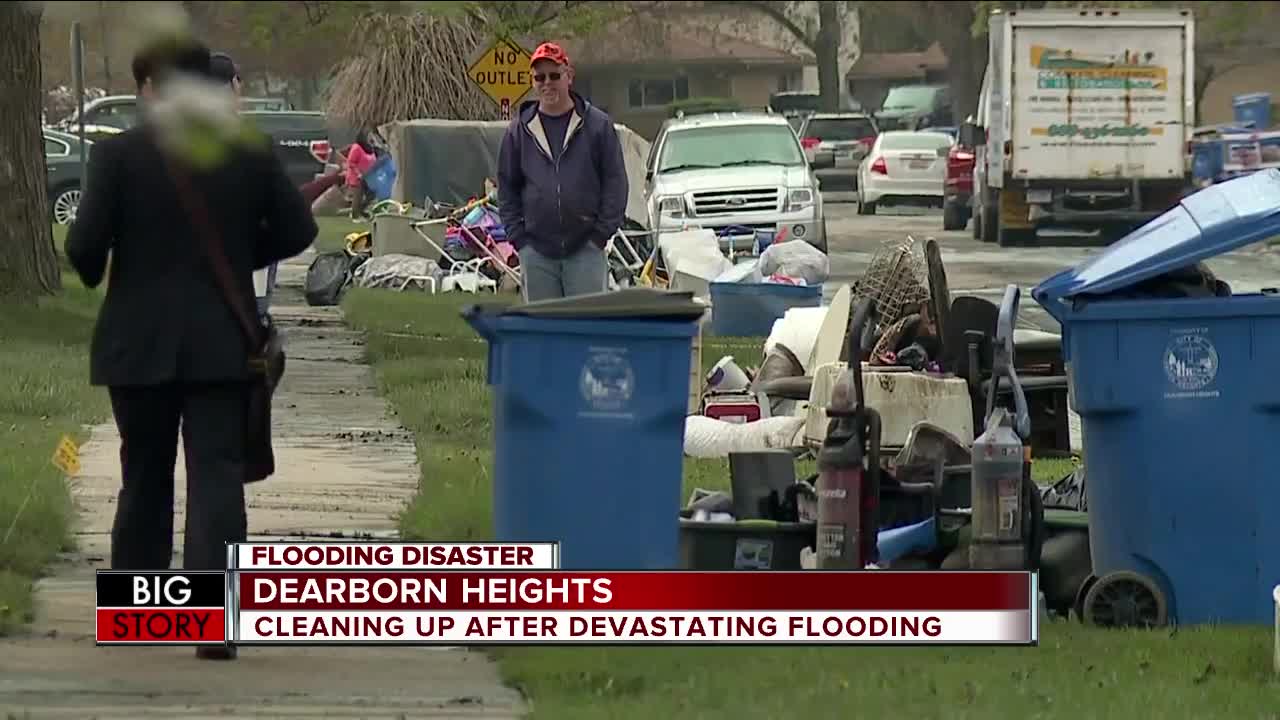 Dearborn Heights residents clean up after flooding, brace for more rain
