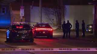 Man in custody after charging at Cleveland police with gun in hand