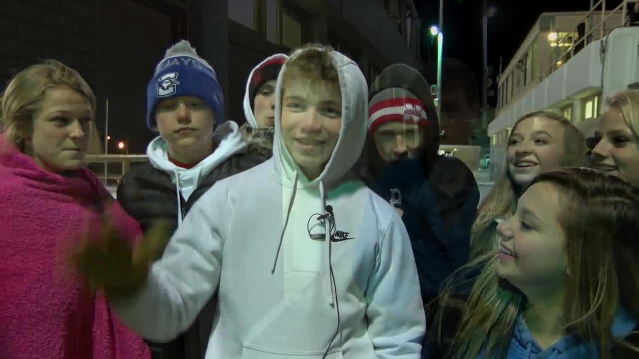 Fans forced to watch playoff football in freezing temps