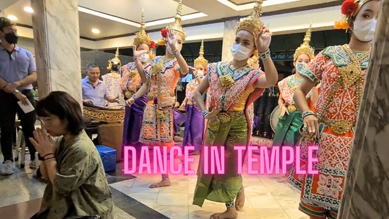 Experience the Magic of Bangkok: Tourist Girls Performing Viral Traditional Buddhist Dance