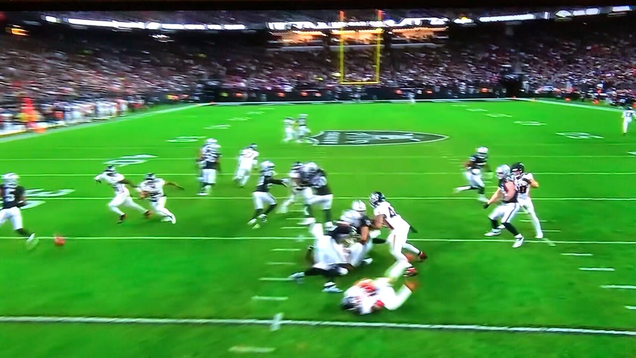 Falcons block the Raiders punt attempt.