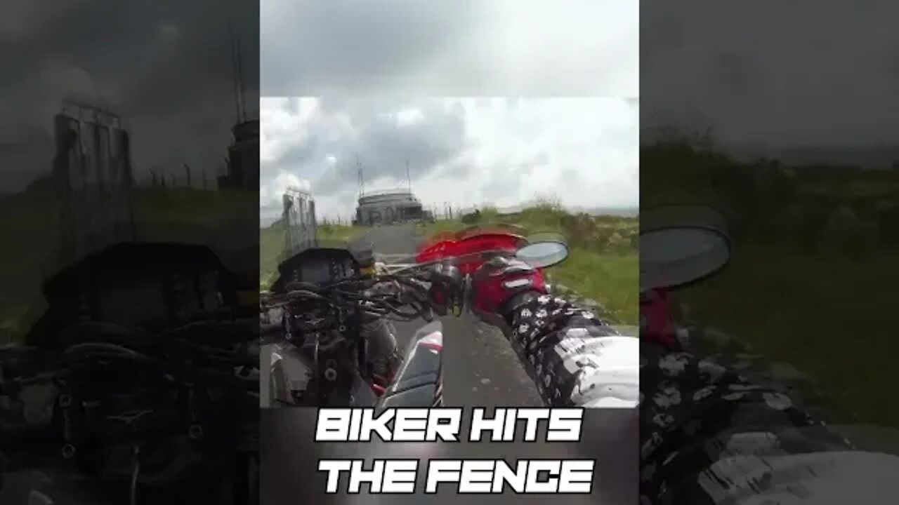 Biker FAILS a wheelie and hits the fence.