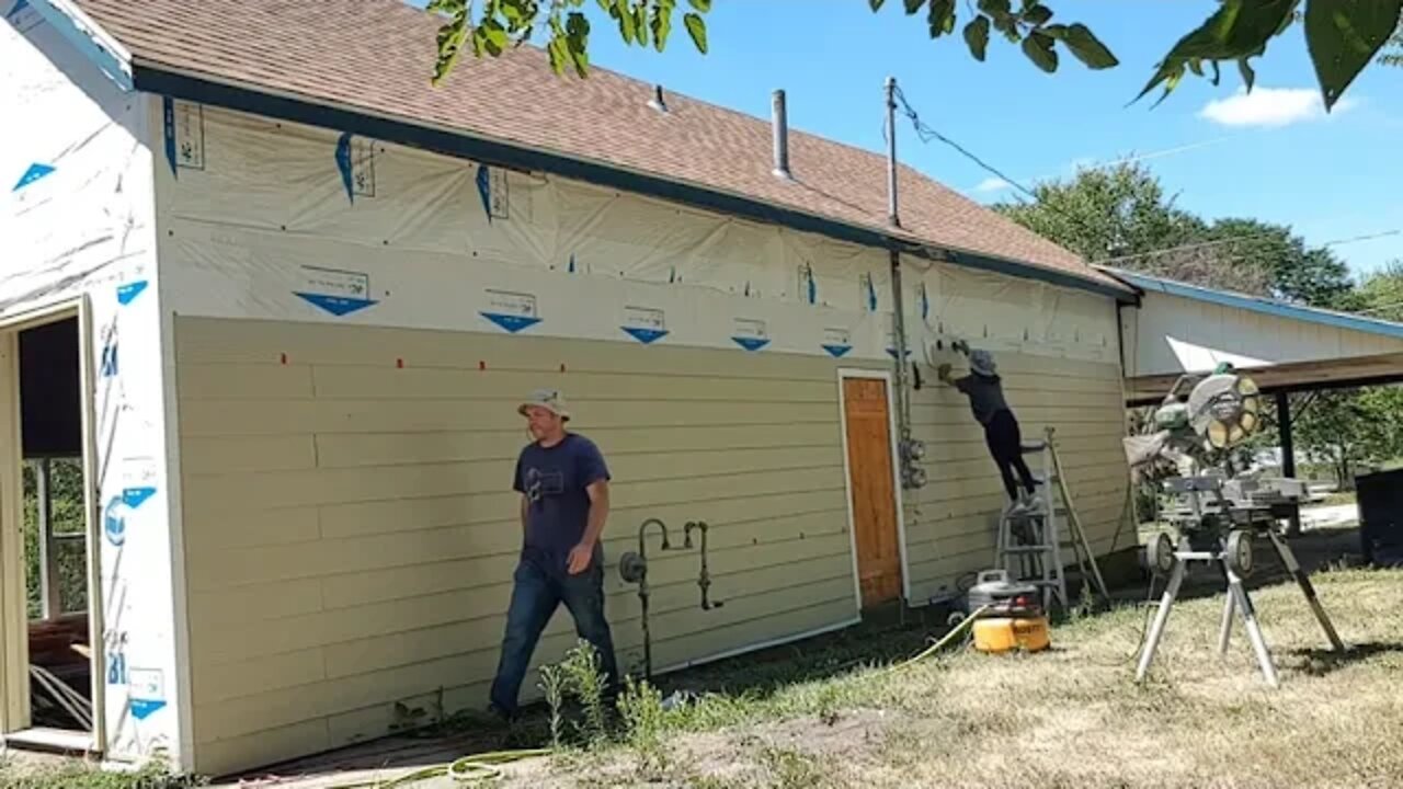 Installing LP SmartSide Siding on North Wall at Chicken Coop Duplex. DIY