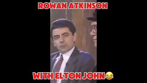 Rowan Atkinson with Elton John