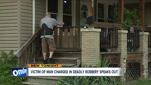 Man robbed by Akron accused murderer speaks out