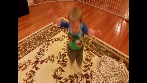 Determined Little Boy Learns how to Hop on One Foot