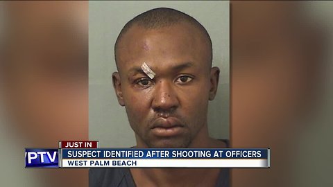 Police say they have identified the man accused of shooting at two officers