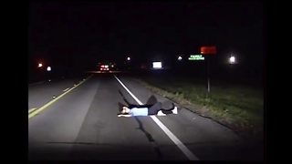 Stunning dashcam video shows intoxicated woman passed out in roadway