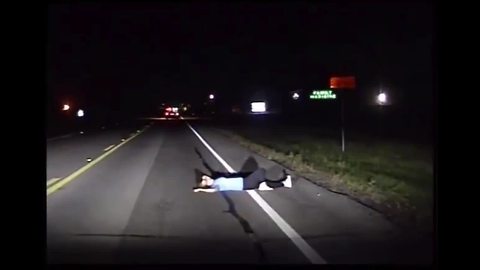 Stunning dashcam video shows intoxicated woman passed out in roadway