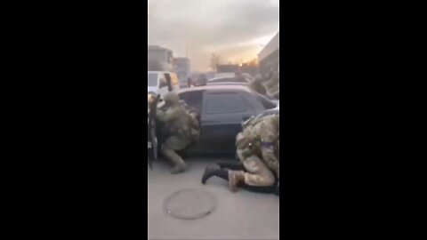 Ukrainian Soldiers Beating civilians