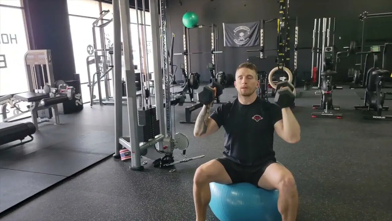 Swiss Ball Dumbbell Overhead Presses