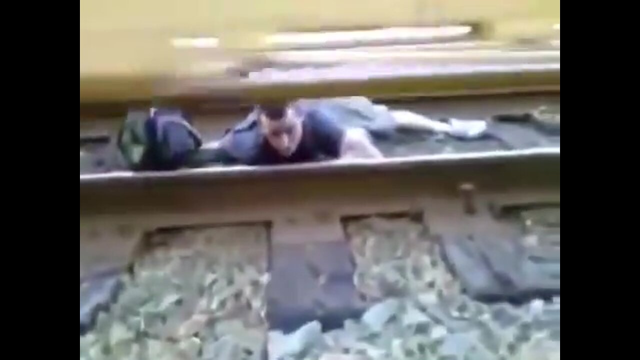 Narrow Escape: Man Survives Under Moving Train😱🚆🚂😲