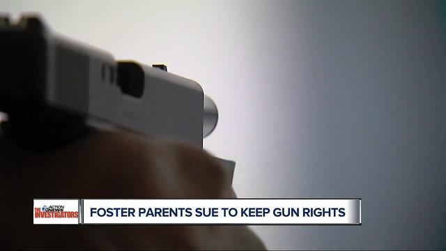 Foster parents sue over gun rights