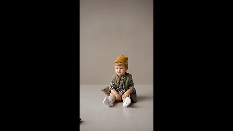 Baby playing with car