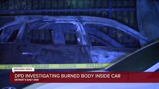 DPD investigating burned body inside car