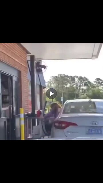 Woman confronts Chick-fil-A staff after leaving her car.