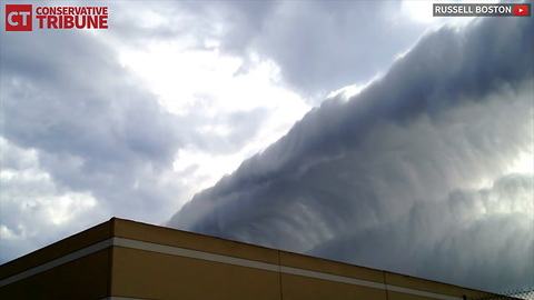 Massive "Wave" Towers Over Beach Town