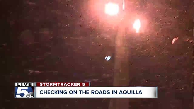 Checking on the roads in Aquilla