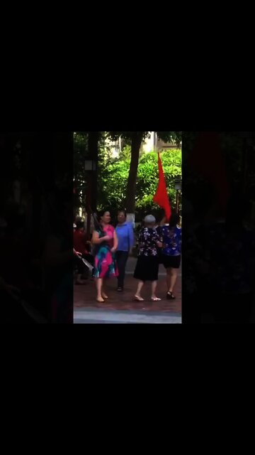 Chinese Dama Vow to Beat Whoever Dares to Start a War 中國大媽唱軍歌