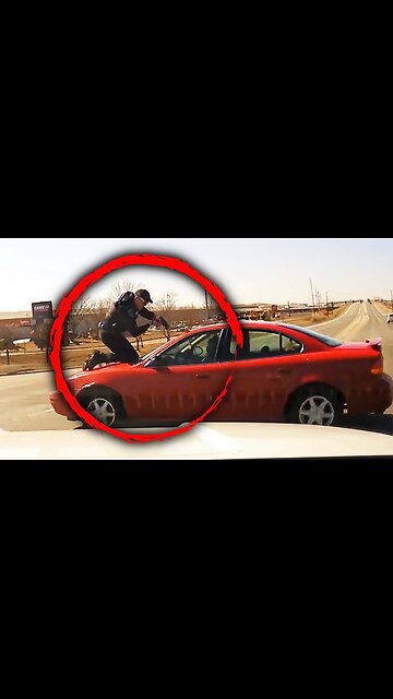 Suspect fled from law enforcement while an officer was on the hood of the vehicle