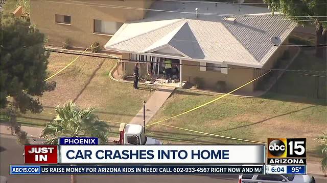 Car crashes into home near 17th Ave and Highland