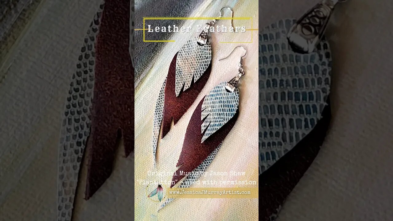 Body Positive, 4 inch leather feather earrings