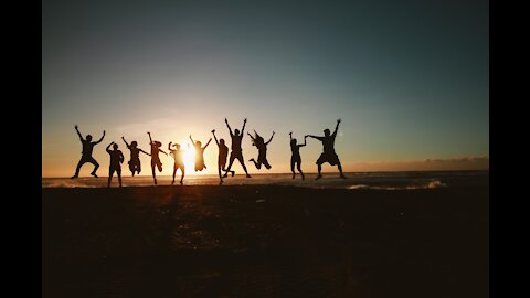 People Enjoying The Beach In The Morning