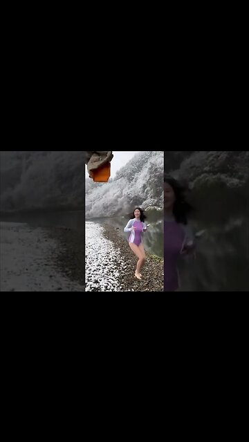 Crazy Chinese Girl Prepares To Jump Into A Freezing Lake