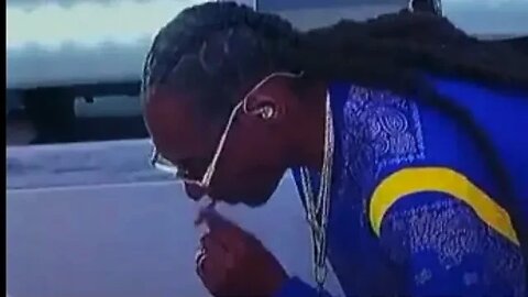 Snoop Dogg caught smoking at the Superbowl