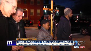 Dozens walk for peace in West Baltimore