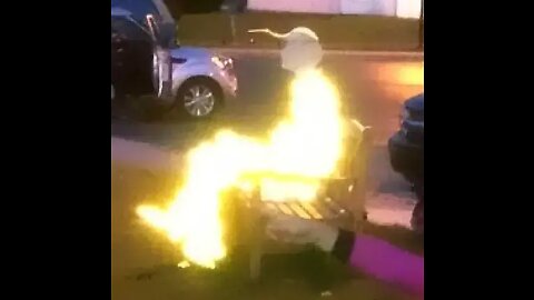 Fiery Humanoid Photo Taken on Park Bench