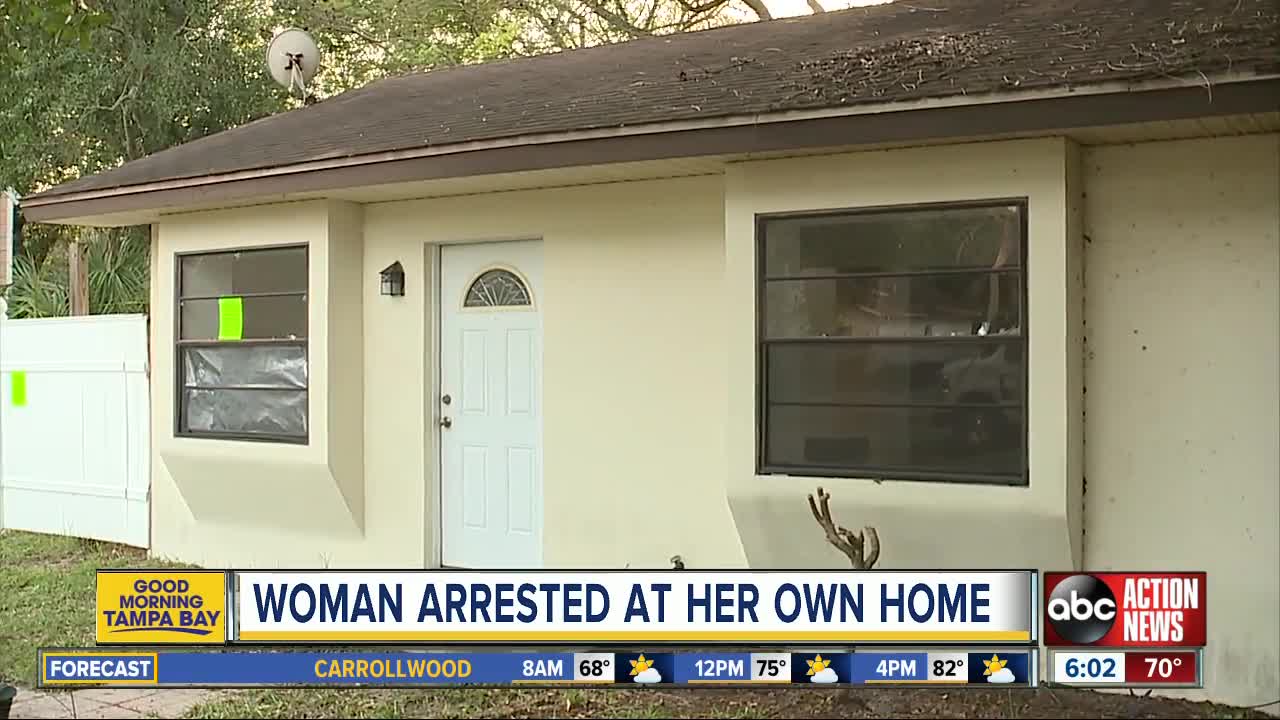 Tampa woman handcuffed after trying to kick out squatters