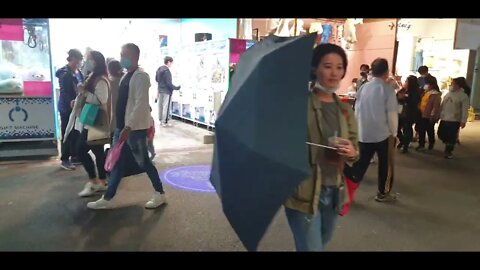 people watching at Shilin night market