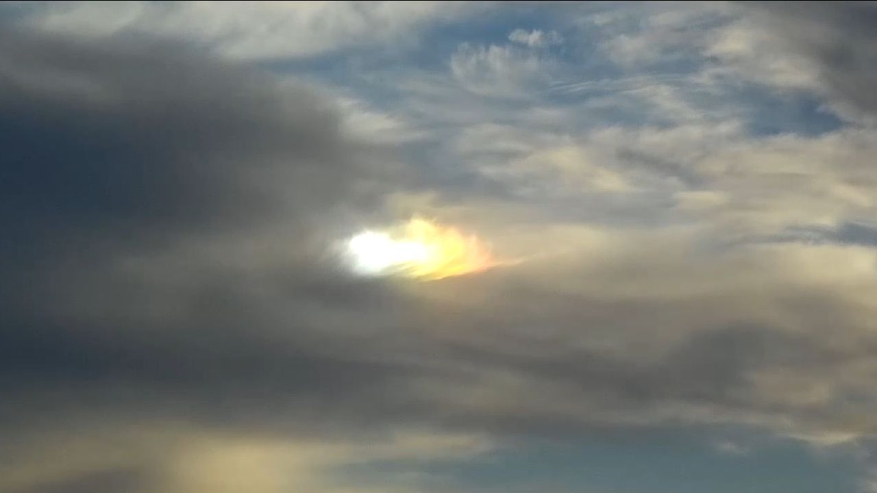 Strange light reflecting cloud shapes in the sky