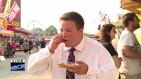 Max Grossfeld eats cricket nachos at Wisconsin State Fair