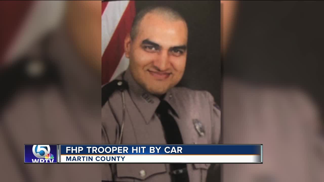 FHP trooper hit by car while working crash on I-95 in Martin County