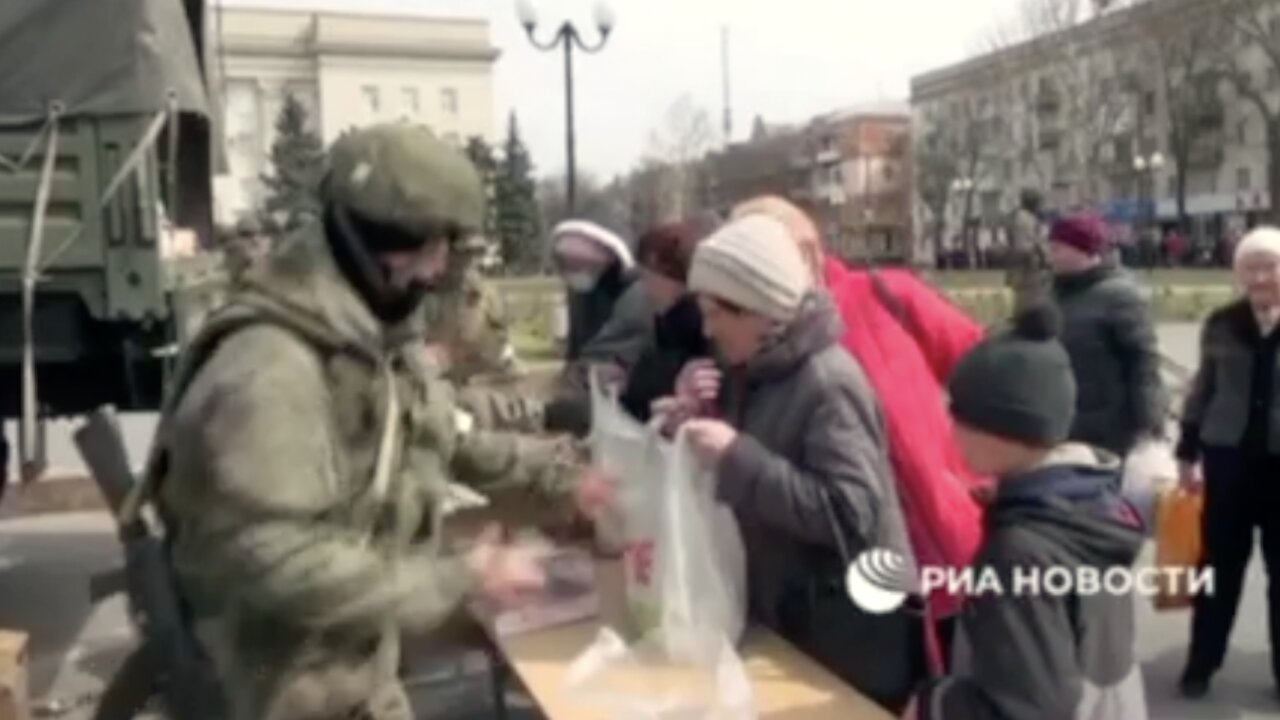 RUSSIAN TROOPS HELPING CIVILIANS IN HERSON, UKRAINE