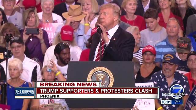 In Phoenix speech, Trump blames media for condemnation of comments on Virginia